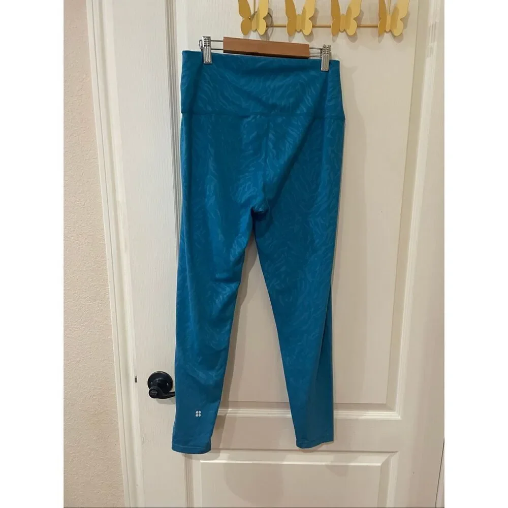 SWEATY BETTY All Day High Waist Emboss Leggings Blue Tiger size 10/large